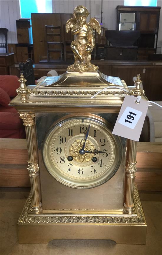 Square French clock with cherub on top